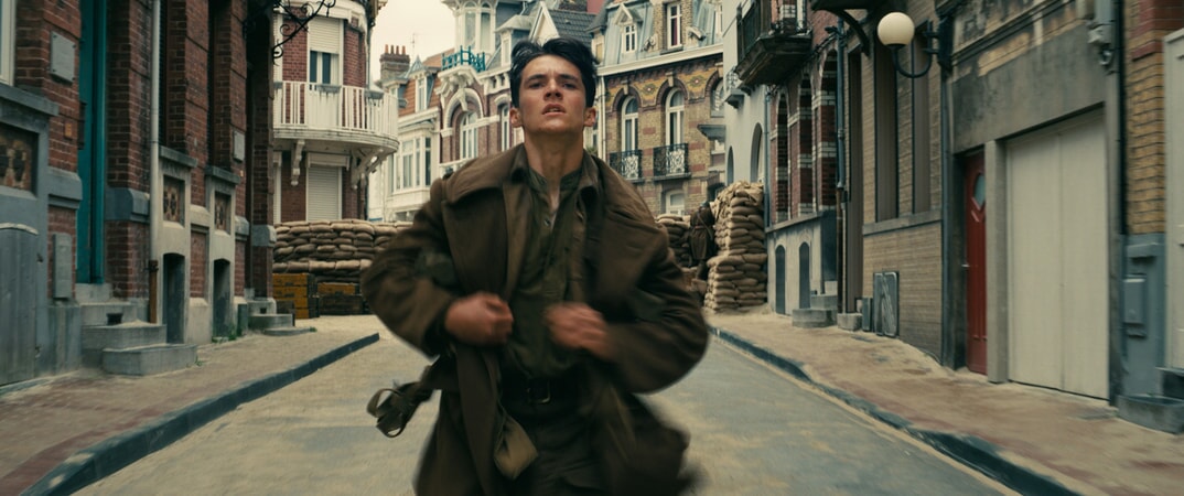 FIONN WHITEHEAD as Tommy in the Warner Bros. Pictures action thriller "DUNKIRK," a Warner Bros. Pictures release.