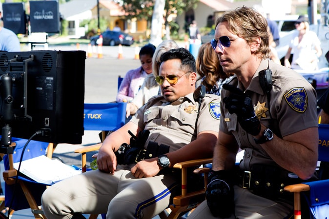 MICHAEL PEÑA and writer/director/star DAX SHEPARD behind the scenes on Warner Bros. Pictures' action comedy "CHIPS," a Warner Bros. Pictures release.