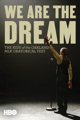 We Are the Dream: The Kids of the Oakland MLK Oratorical Fest - Child stands on stage hand lifted