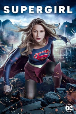 Melissa Benoist as Supergirl kneeling in debris of city destruction