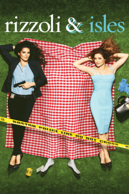 Angie Harmon and Sasha Alexander lying on the green grass over red checkered picnic blanket
