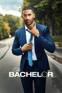 The Bachelor: Season 25 - Matt James wearing a blue tuxedo adjusting blue tie